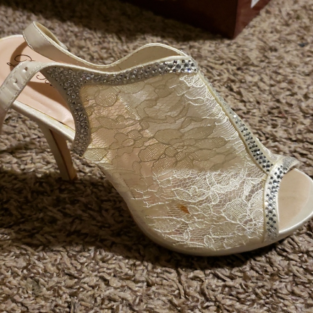 White/cream lace heels